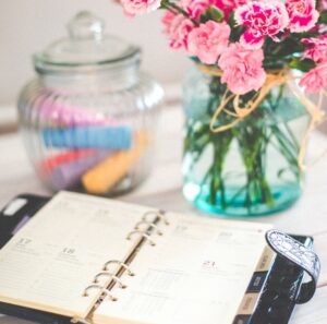 calendar on the table with flowers